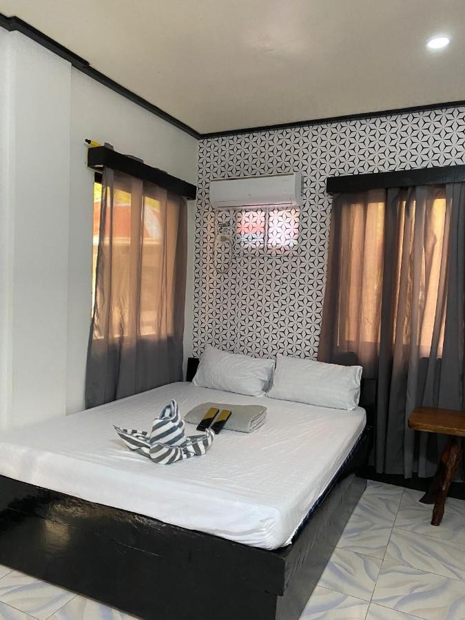 Mia Affordable Rooms Эль-Нидо Экстерьер фото
